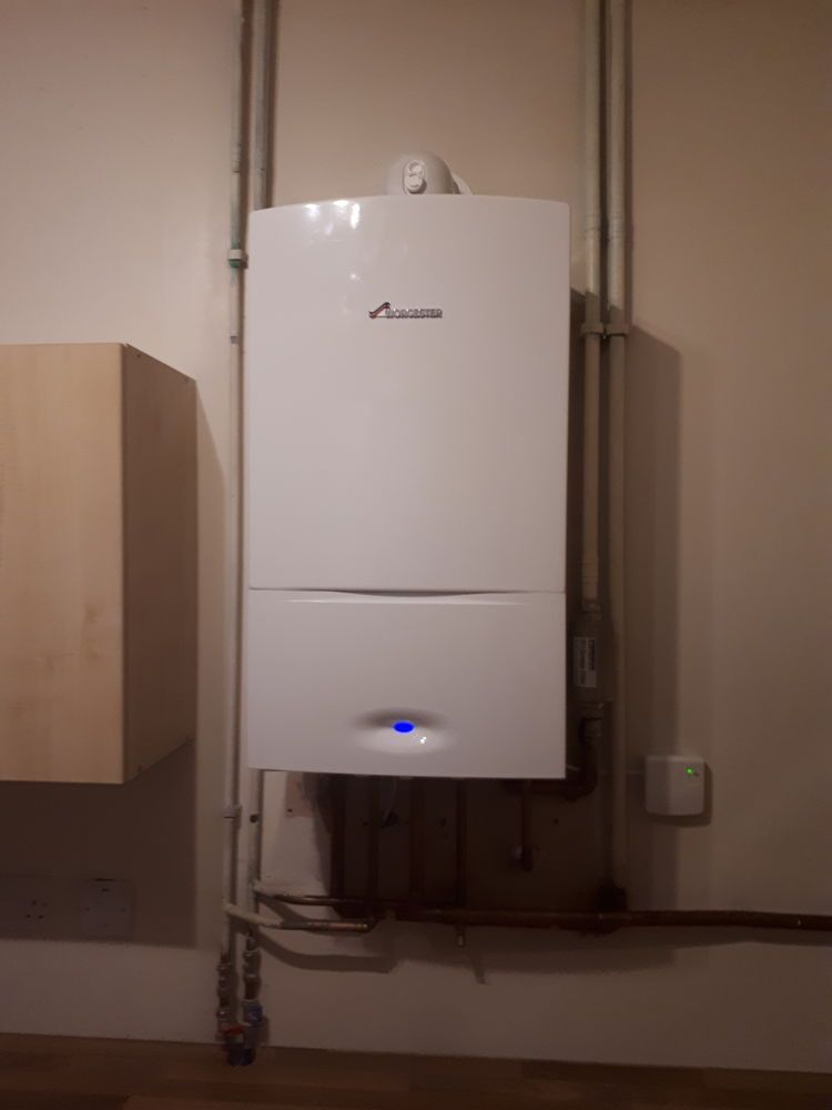 Wall mounted combi boiler with copper pipework